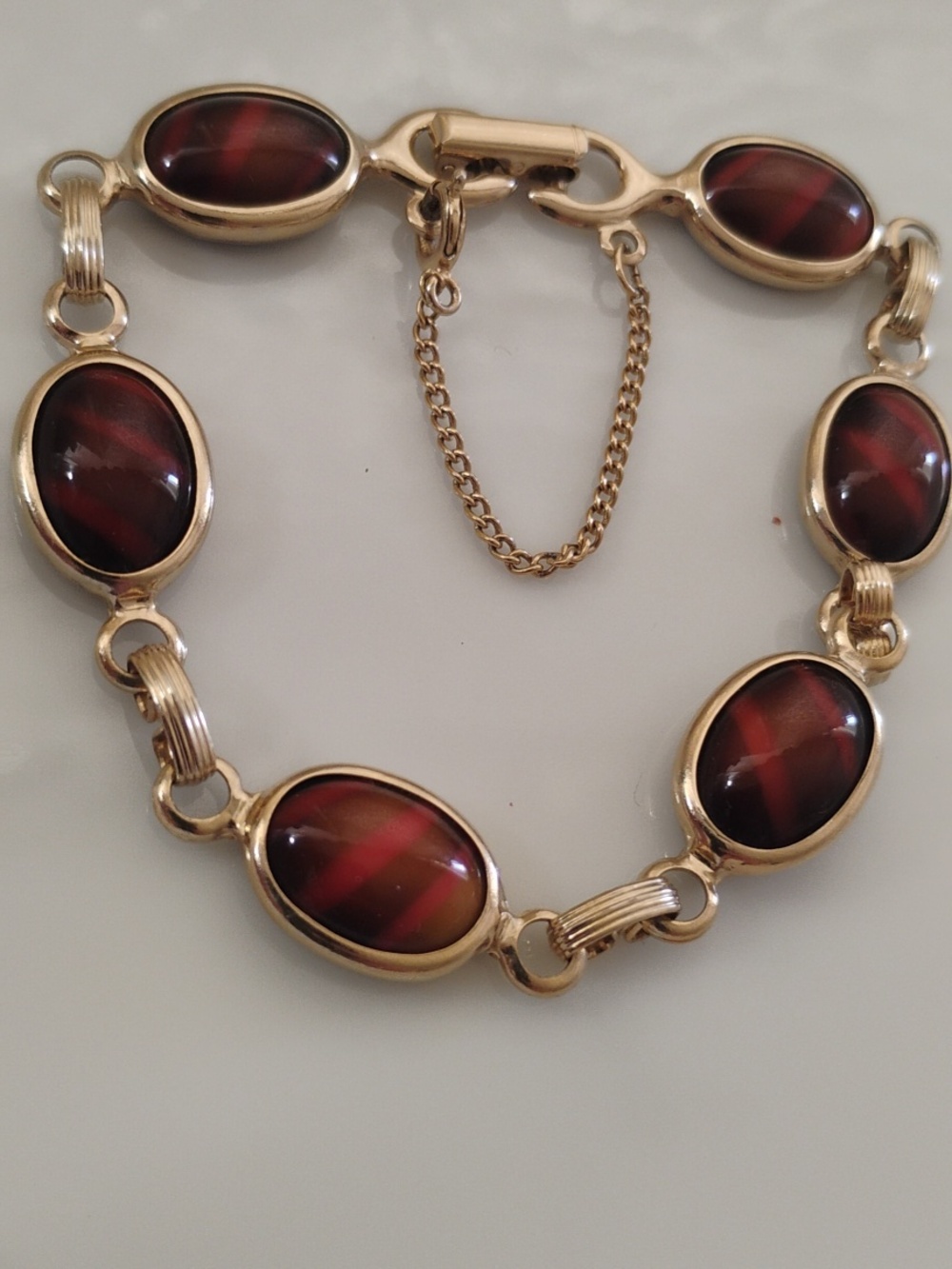 Sarah  Cov. signed Oval Design with Brown and Black tones Dainty Style